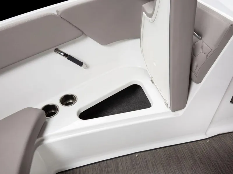 Slide: The Image of 2025 Four Winns H1 boat interior with storage compartment and cup holders. - 12