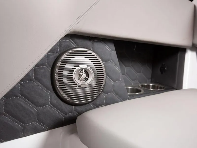 Slide: The Image of Interior of 2025 Four Winns H1 boat with speaker and cup holders. - 17