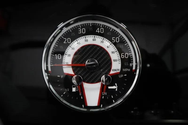 Slide: The Image of 2025 Four Winns H1 speedometer with carbon fiber design, displaying speed in MPH and KM/H. - 29
