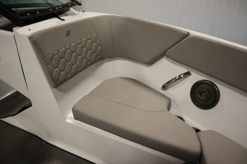 Slide: The Image of 2025 Four Winns H1 boat interior with gray seating and speaker. - 30