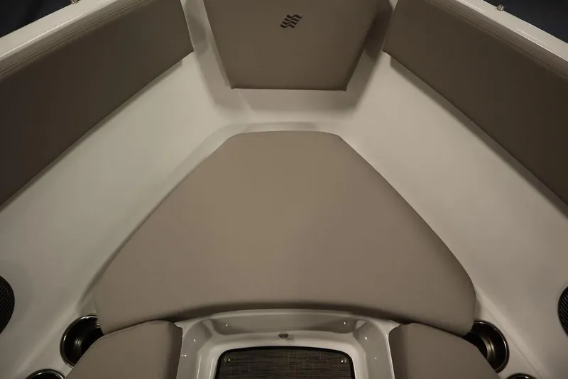 Slide: The Image of 2025 Four Winns H1 boat interior with cushioned seating and modern design. - 33