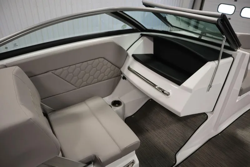 Slide: The Image of 2025 Four Winns H1 boat interior with sleek seating and modern design. - 49