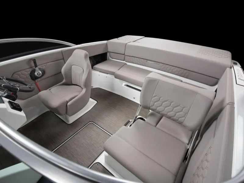 Slide: The Image of 2025 Four Winns H1 boat interior with modern seating and steering wheel. - 7