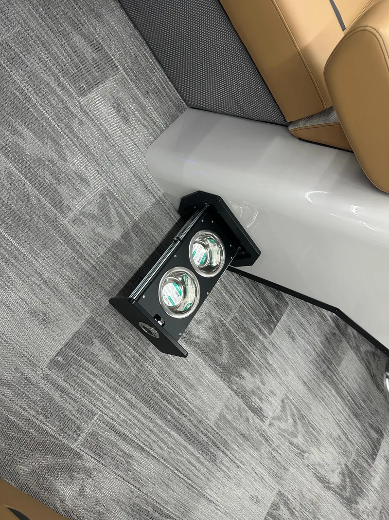 Slide: The Image of Interior of 2025 Crest Classic 220 boat with modern flooring and lighting. - 5