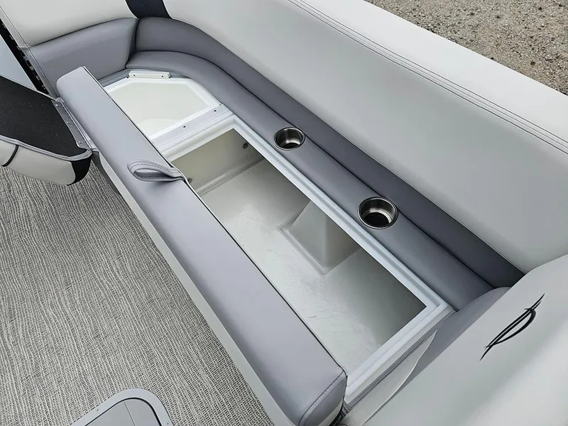 Slide: The Image of 2025 SunCatcher Select 322C boat seat storage with cup holders and gray upholstery. - 21