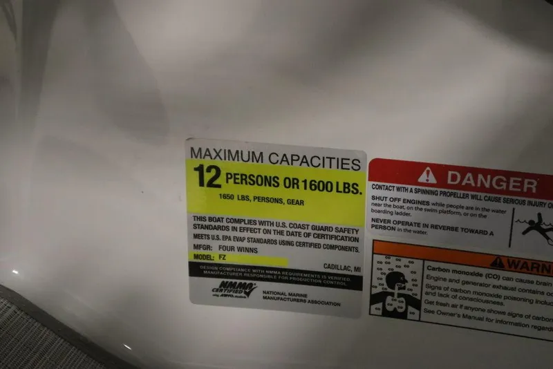 Slide: The Image of 2025 Four Winns H2 boat capacity label, maximum 12 persons or 1600 lbs. - 20