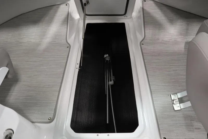 Slide: The Image of 2025 Four Winns H2 boat interior storage compartment with sleek design and modern finish. - 31