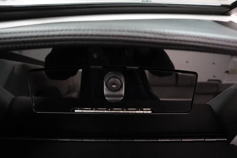 Slide: The Image of 2025 Four Winns H2 dashboard with sleek black panel and modern design. - 32