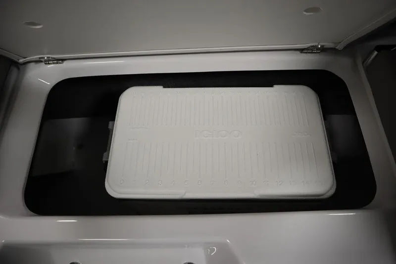 Slide: The Image of Storage compartment with Igloo cooler in 2025 Four Winns H2 boat. - 38