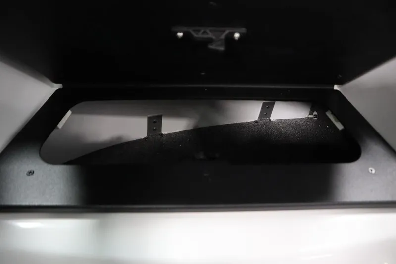 Slide: The Image of Storage compartment of 2025 Four Winns H2 boat, showcasing interior design. - 39