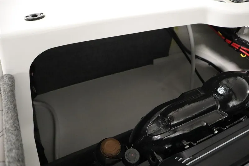 Slide: The Image of Engine compartment of 2025 Four Winns H2 boat, showcasing mechanical components and wiring. - 45