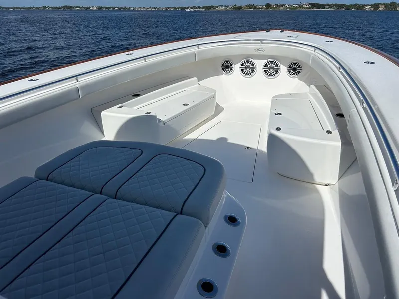 Slide: The Image of 2020 Valhalla Boatworks 41 model, featuring spacious seating and sleek design on open water. - 23