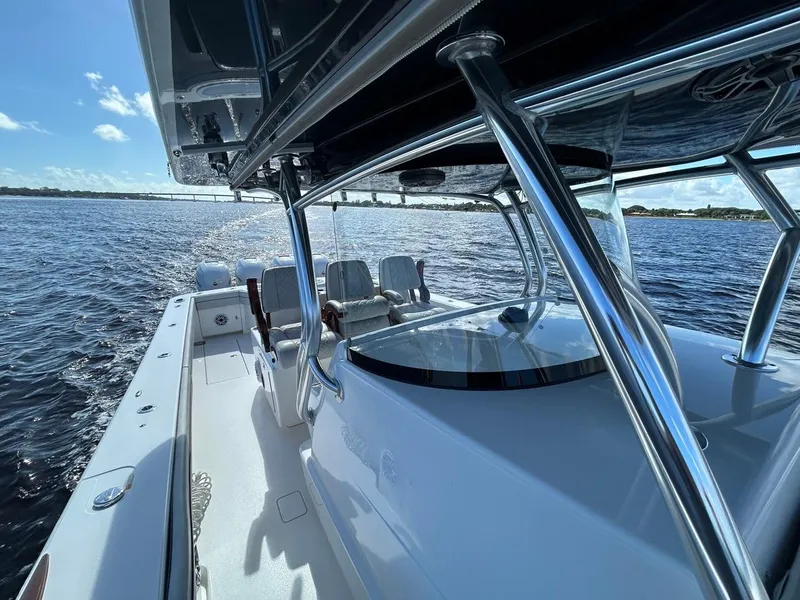 Slide: The Image of 2020 Valhalla Boatworks 41 on water, showcasing sleek design and spacious deck. - 25