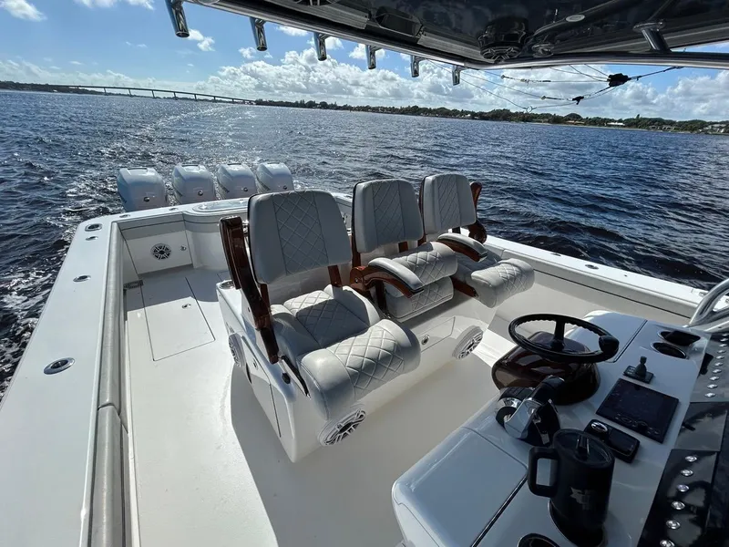 Slide: The Image of 2020 Valhalla Boatworks 41 with luxurious seating, cruising on open water. - 26