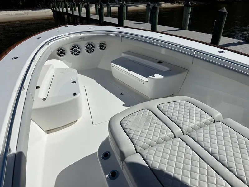 Slide: The Image of 2020 Valhalla Boatworks 41 interior with cushioned seating and storage compartments. - 35