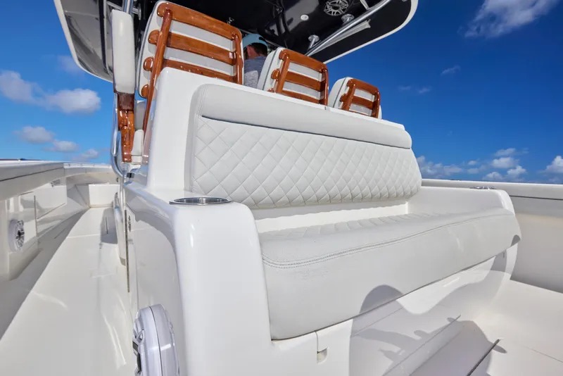Slide: The Image of 2020 Valhalla Boatworks 41 interior with luxurious seating and clear blue sky. - 4