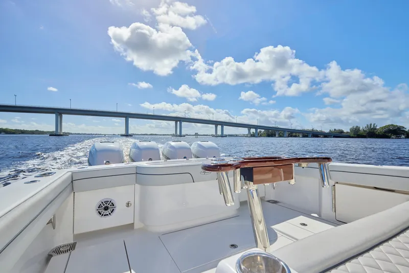 Slide: The Image of 2020 Valhalla Boatworks 41 cruising under a sunny sky near a bridge. - 5