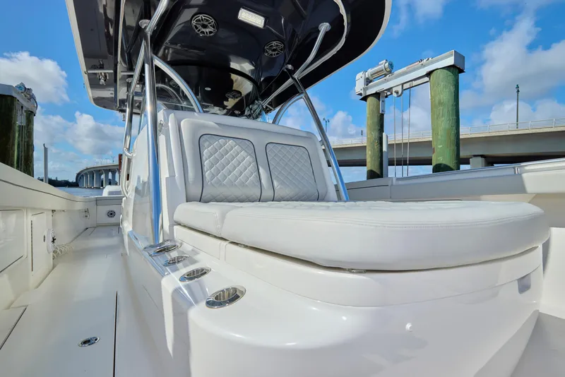 Slide: The Image of 2020 Valhalla Boatworks 41, luxury seating, sleek design, docked under blue sky. - 6