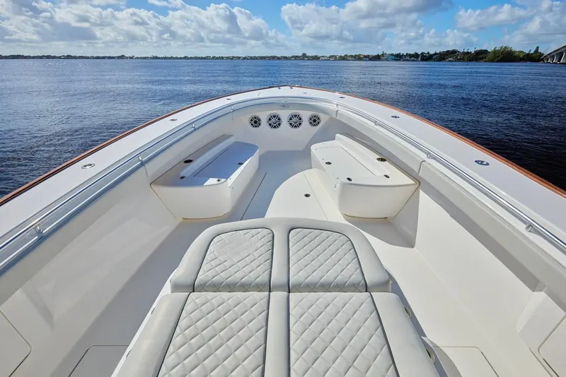 Slide: The Image of 2020 Valhalla Boatworks 41 with spacious deck and seating, overlooking calm waters. - 7