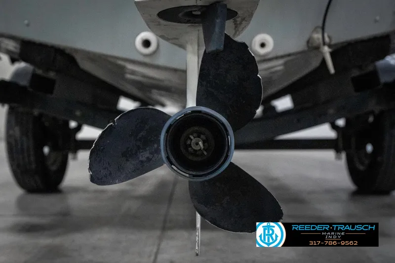 Slide: The Image of Propeller of a 1990 Lowe 1700 boat in a garage setting. - 43