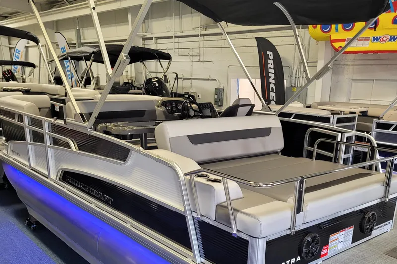 Slide: The Image of 2025 Princecraft Vectra 21 RL pontoon boat with sleek design and modern features. - 21