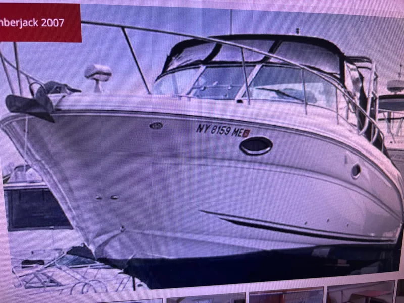 The Image of 2007 Sea Ray Amberjack boat docked, featuring sleek design and white exterior. - 0