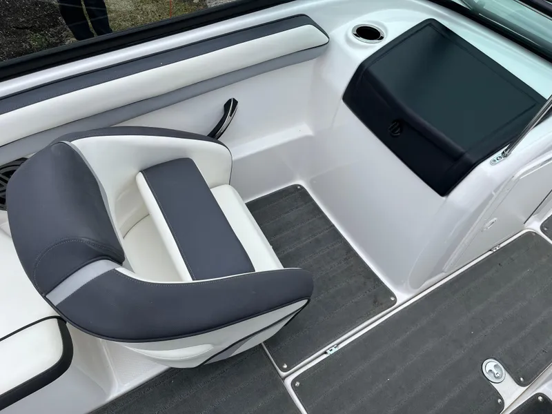 Slide: The Image of 2016 Yamaha Boats SX192 interior with gray and white seating and dashboard. - 4