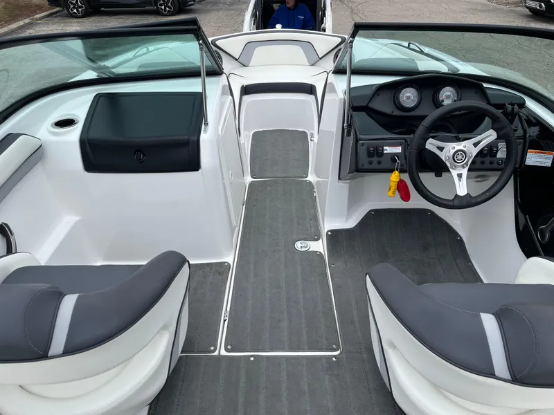 Slide: The Image of 2016 Yamaha Boats SX192 interior with dual seats and steering console. - 6
