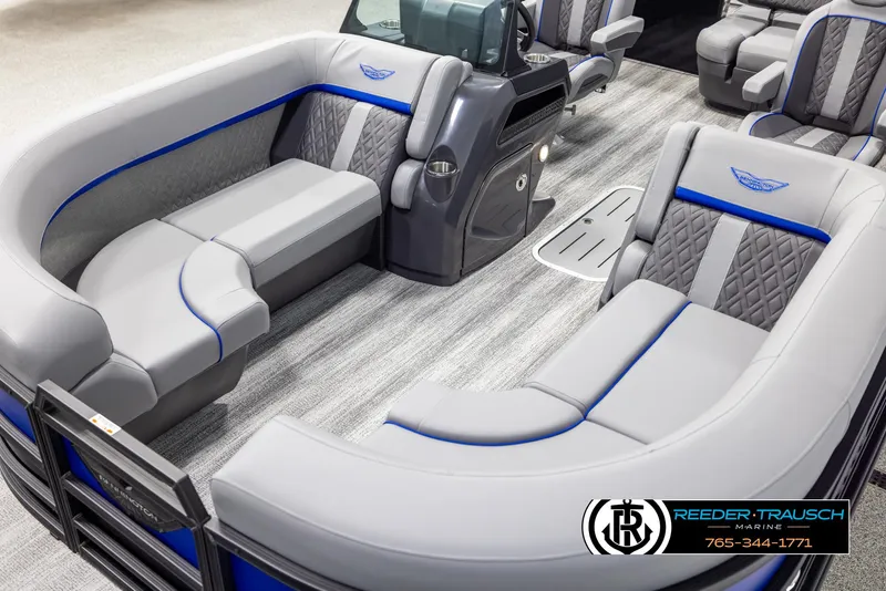 Slide: The Image of 2025 Bennington 22 MSBSE pontoon boat interior with gray and blue seating. - 10