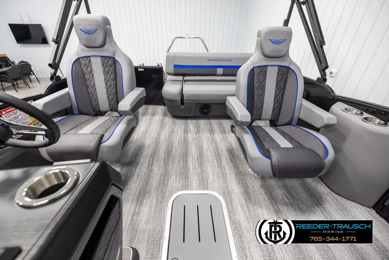 Slide: The Image of 2025 Bennington 22 MSBSE boat interior with modern seating and sleek design. - 14