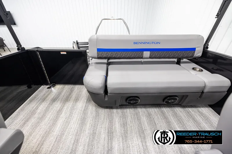 Slide: The Image of 2025 Bennington 22 MSBSE boat interior with gray seating and carpeted flooring. - 15