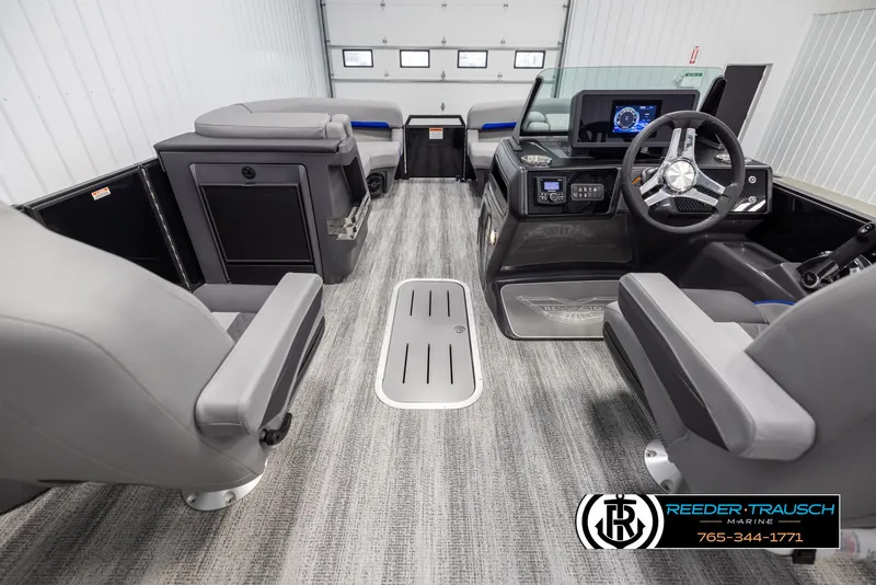 Slide: The Image of Interior of 2025 Bennington 22 MSBSE boat with modern seating and steering console. - 17