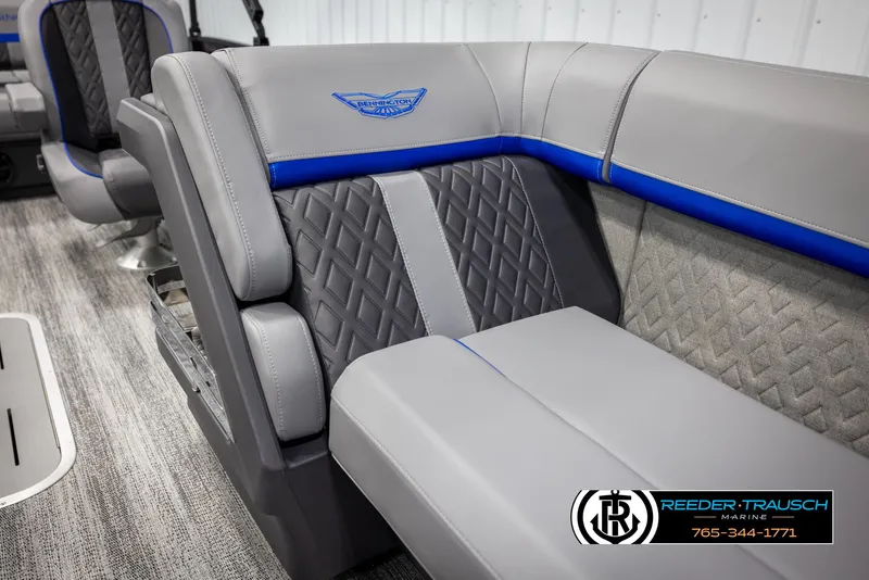 Slide: The Image of 2025 Bennington 22 MSBSE boat interior with gray and blue seating, quilted design. - 20
