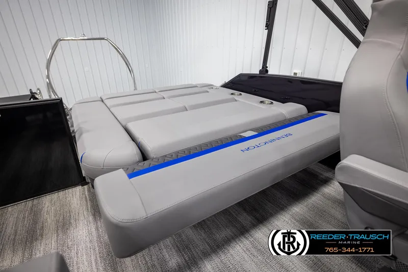 Slide: The Image of 2025 Bennington 22 MSBSE boat interior with gray seating and blue accents. - 27
