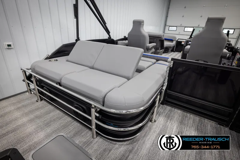 Slide: The Image of 2025 Bennington 22 MSBSE pontoon boat interior with gray seating and modern design. - 31