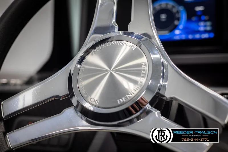 Slide: The Image of 2025 Bennington 22 MSBSE steering wheel, chrome finish, close-up view. - 34