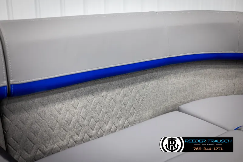 Slide: The Image of 2025 Bennington 22 MSBSE boat seating with gray and blue upholstery detail. - 41