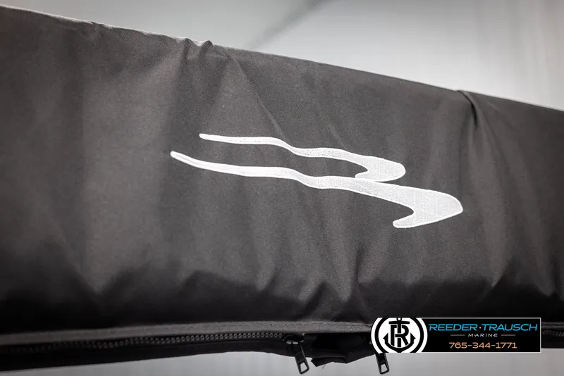 Slide: The Image of 2025 Bennington 22 MSBSE boat cover with logo, featuring Reeder-Trausch Marine branding. - 48