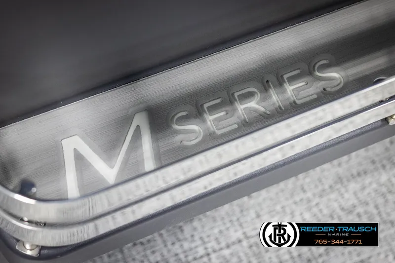 Slide: The Image of 2025 Bennington 22 MSBSE M Series logo detail with Reeder-Trausch Marine branding. - 49