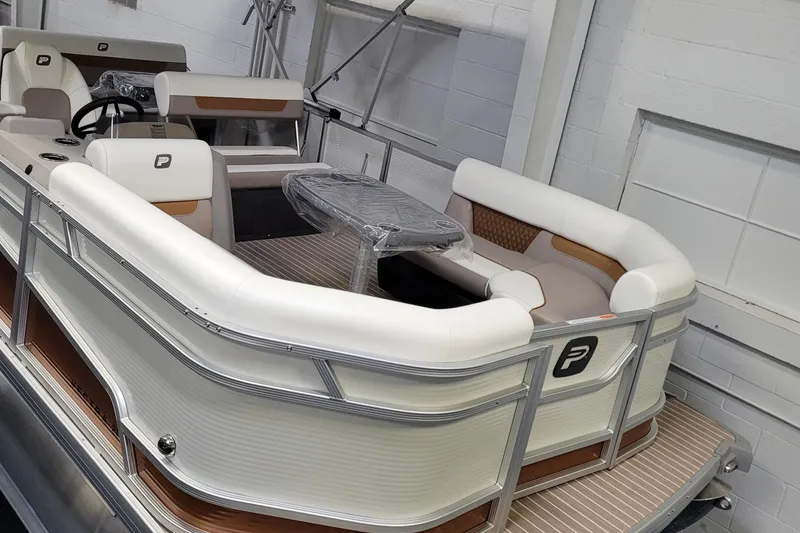 The Image of 2025 Princecraft Vectra 21 RL pontoon boat with white seating and modern design. - 0