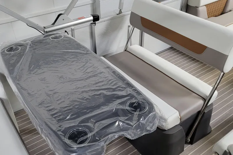 Slide: The Image of 2025 Princecraft Vectra 21 RL boat interior with seating and table. - 5
