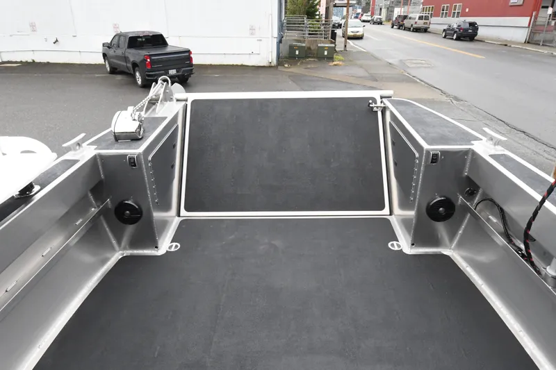 Slide: The Image of Custom 24 LC boat deck, 2025 model, featuring spacious layout and modern design. - 11