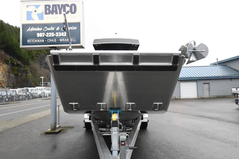 Slide: The Image of 2025 Custom 24 LC boat on trailer at Bayco Marine Sales. - 4