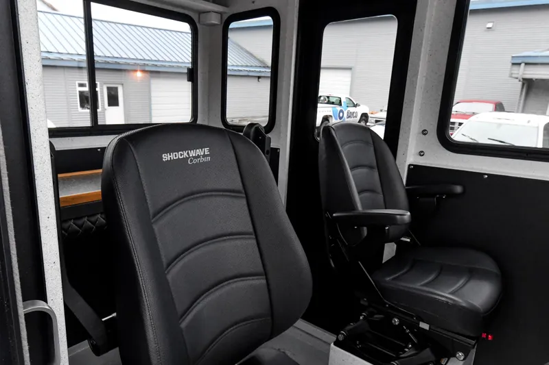 Slide: The Image of Interior of 2025 Custom 24 LC with Shockwave seats, showcasing modern design and comfort. - 8