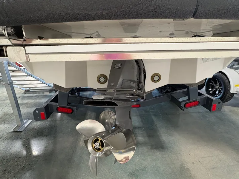 Slide: The Image of 2025 Regal LS6 boat stern with propeller and trailer. - 20