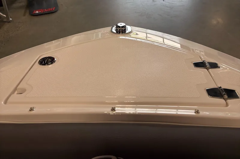 Slide: The Image of 2025 Regal LS6 boat deck with sleek design and chrome accents. - 22