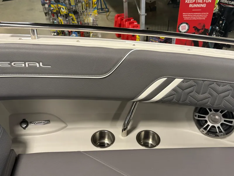 Slide: The Image of Interior of 2025 Regal LS6 boat with cup holders and speaker. - 4