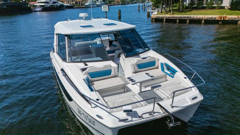 Slide: The Image of Aquila 36 Sport 2019 boat on water, featuring spacious deck and modern design. - 3
