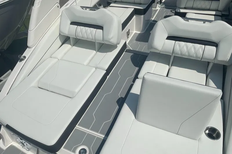 Slide: The Image of 2025 Regal LS4 Surf boat interior with luxurious white seating and modern design. - 20