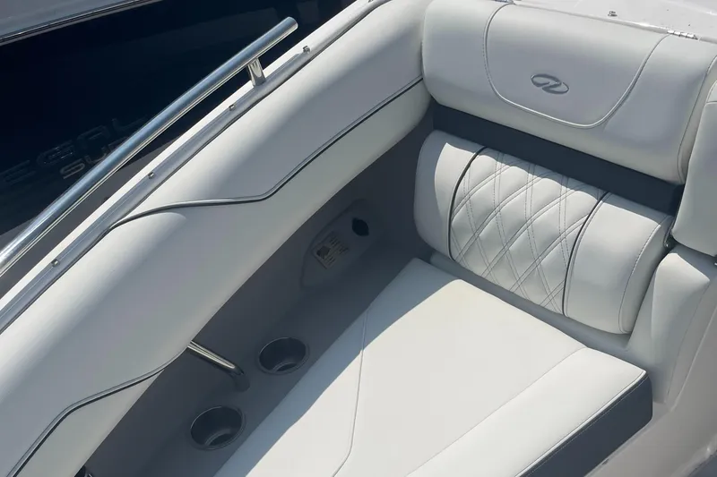 Slide: The Image of Luxurious seating on 2025 Regal LS4 Surf boat with elegant white upholstery. - 9